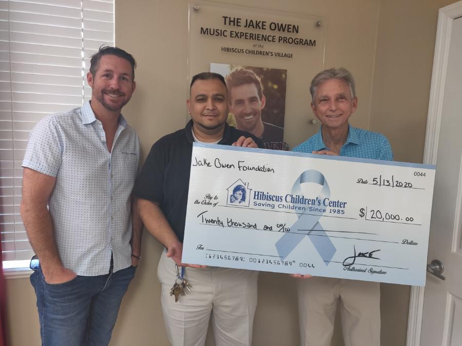 Jarrod Owen & Steve Owen presented the generous donation to Rey Navarro, Director of Village Operations.